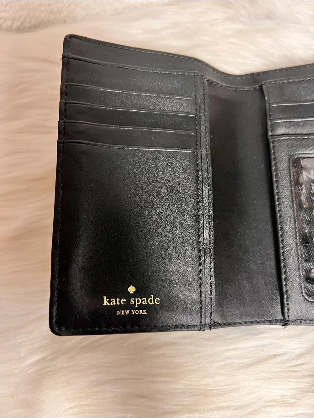 kate spade Black Leather Wallet with Gold Bar Accent